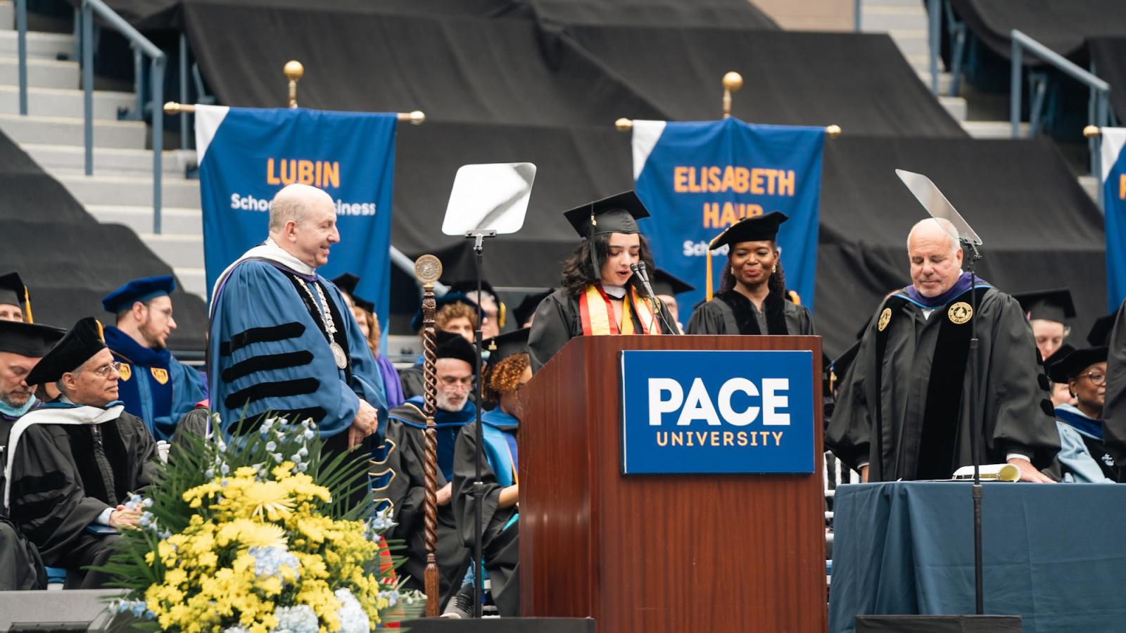 Pace University President Marvin Krislov and Chair Rob Sands on stage at Commencement.