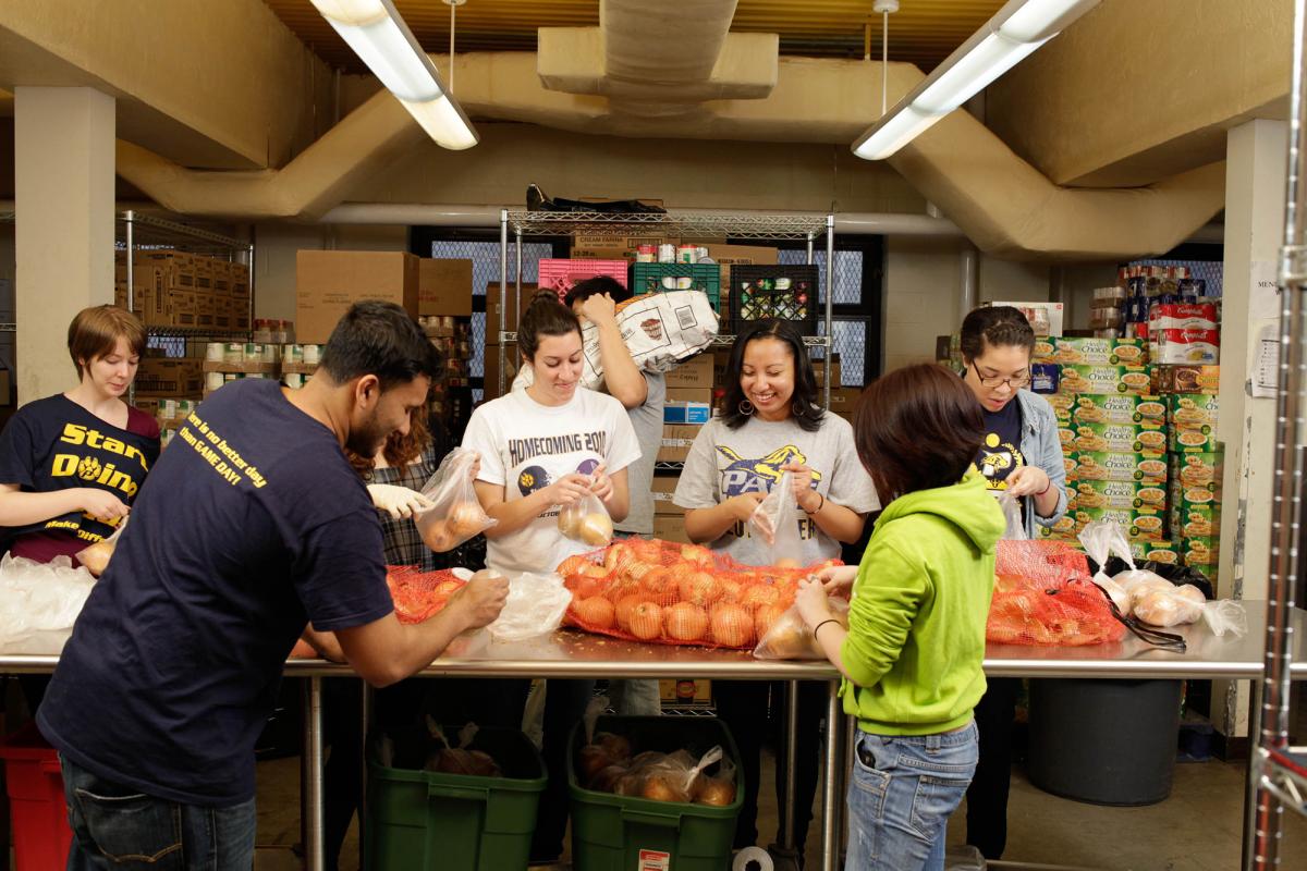 Pace students volunteering at a food pantry.