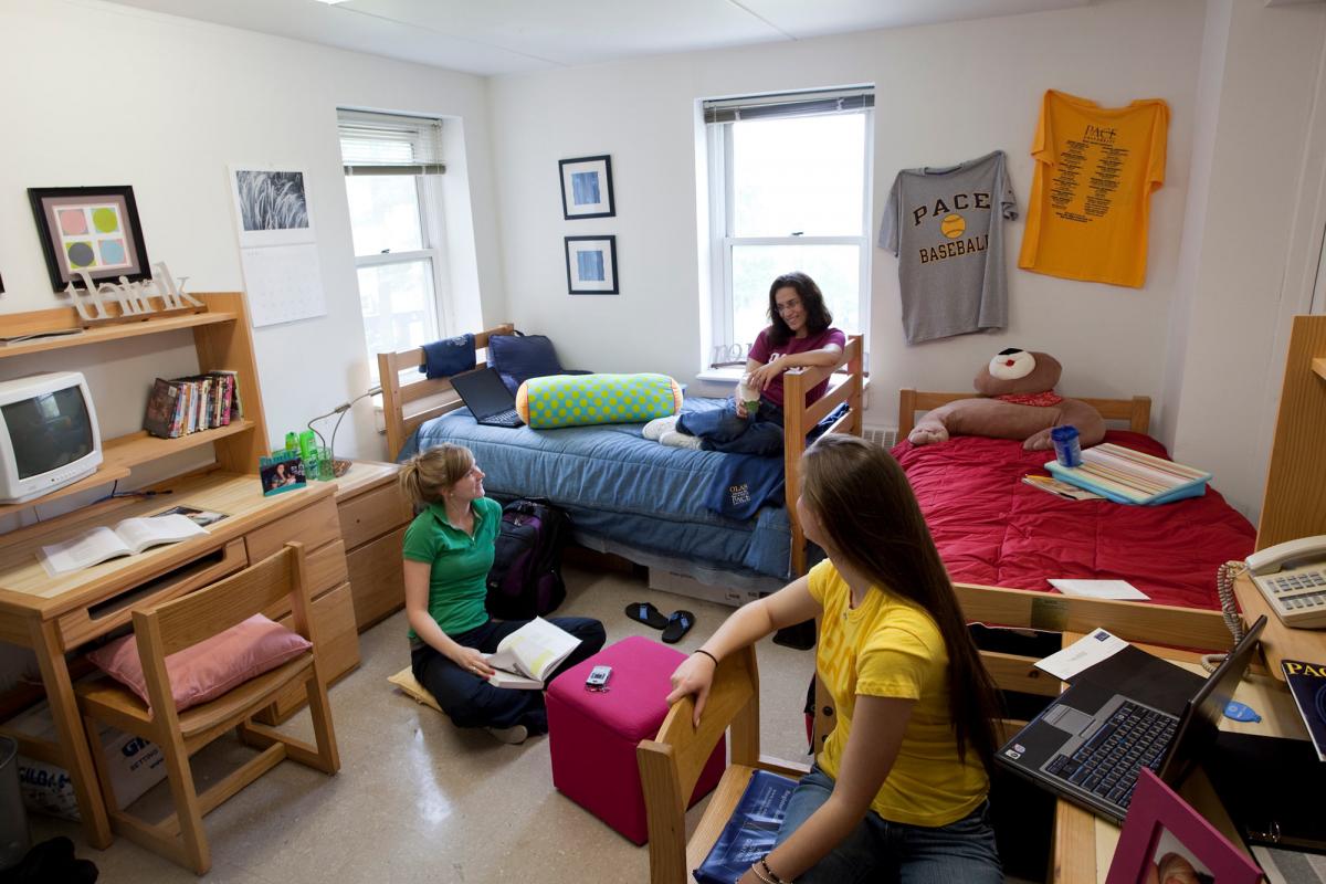 Students spending time in their dorm.
