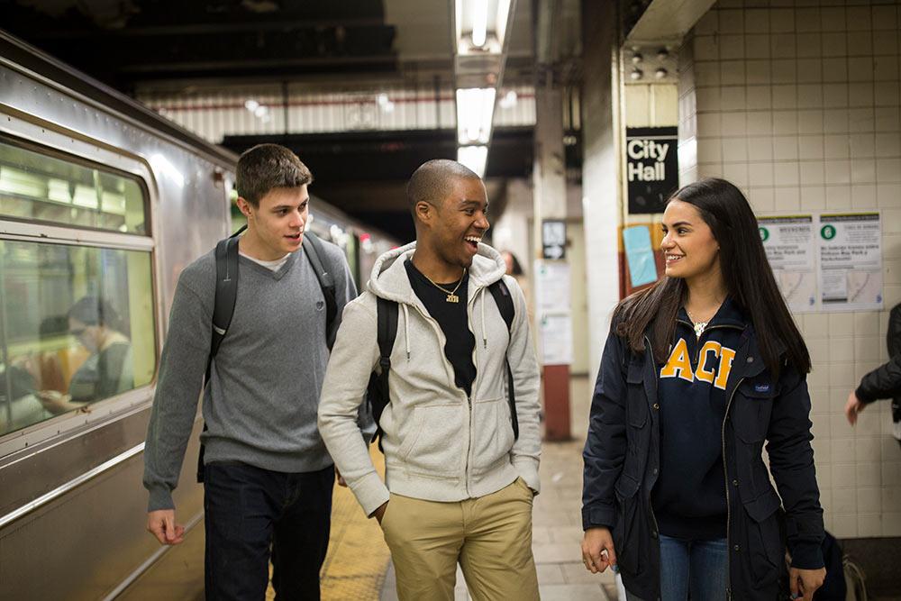 Students getting of the subway at City Hall.