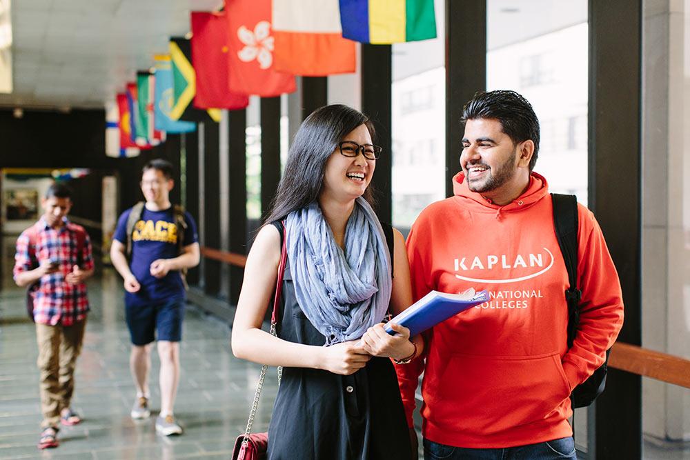 Students walking down a hallway at 1 Pace Plaza.