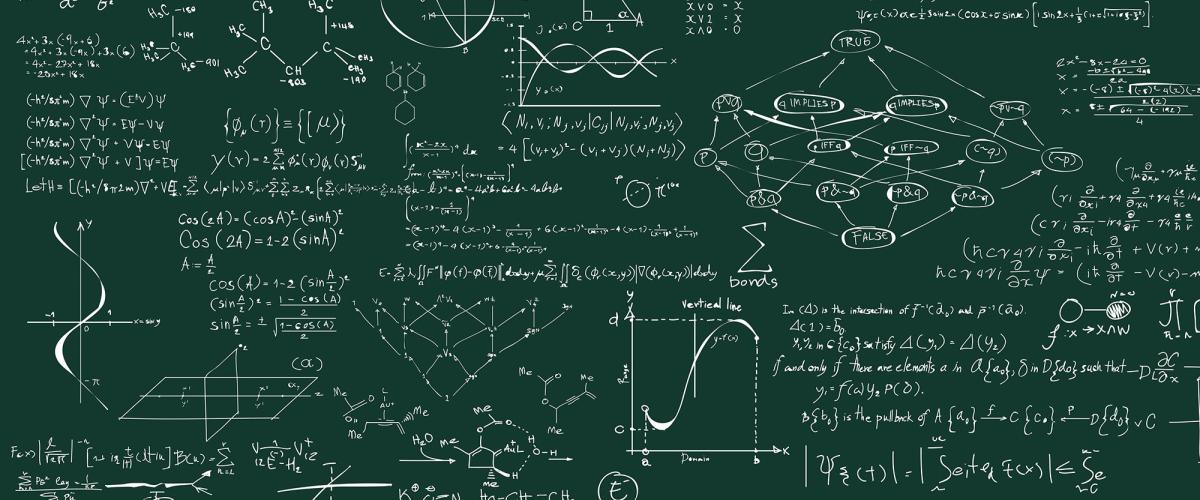 Math equations on a green chalkboard