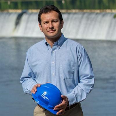 man holding a hard hat