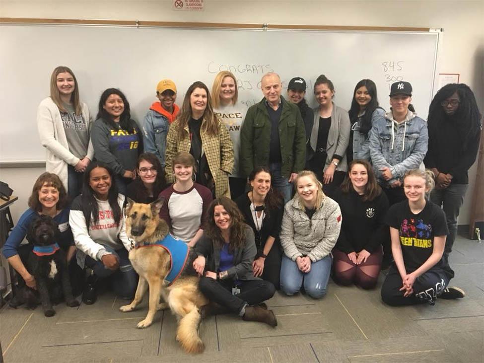 Parenting, Prison, and Pups students with Kimberly Collica-Cox and therapy german shepard dog. 