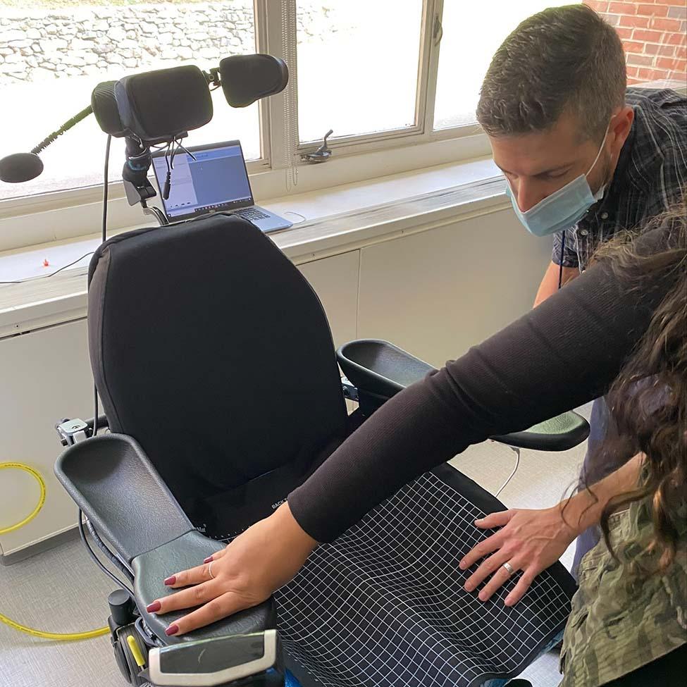 CHP professor and occupational therapist John Damaio analyzing wheelchair