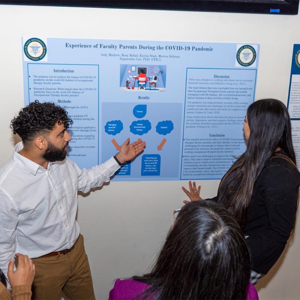 Students presenting poster