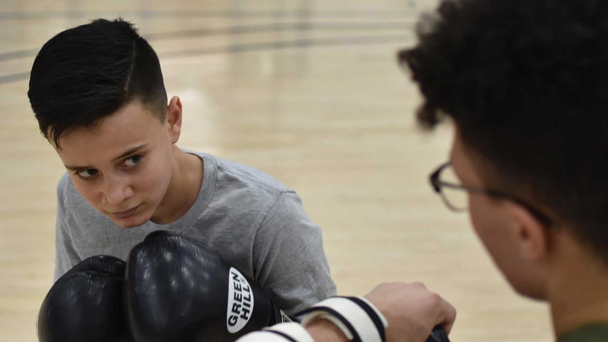 Shahab spars with another student as part of his boxing club, Soulfighter