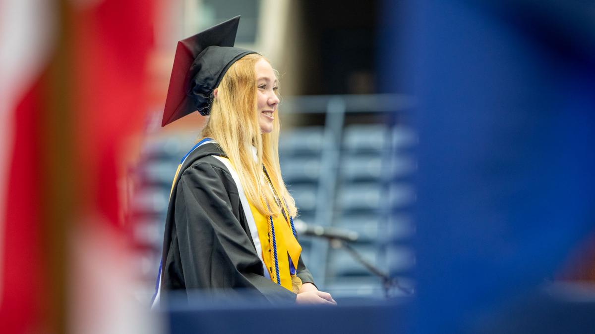 Chloe Mayhew speaking at Commencement