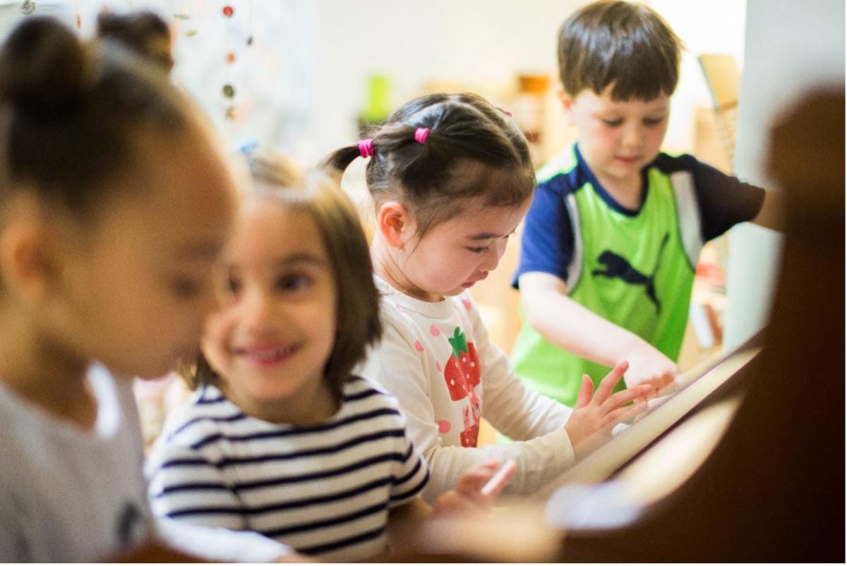 Children interacting in a school setting.