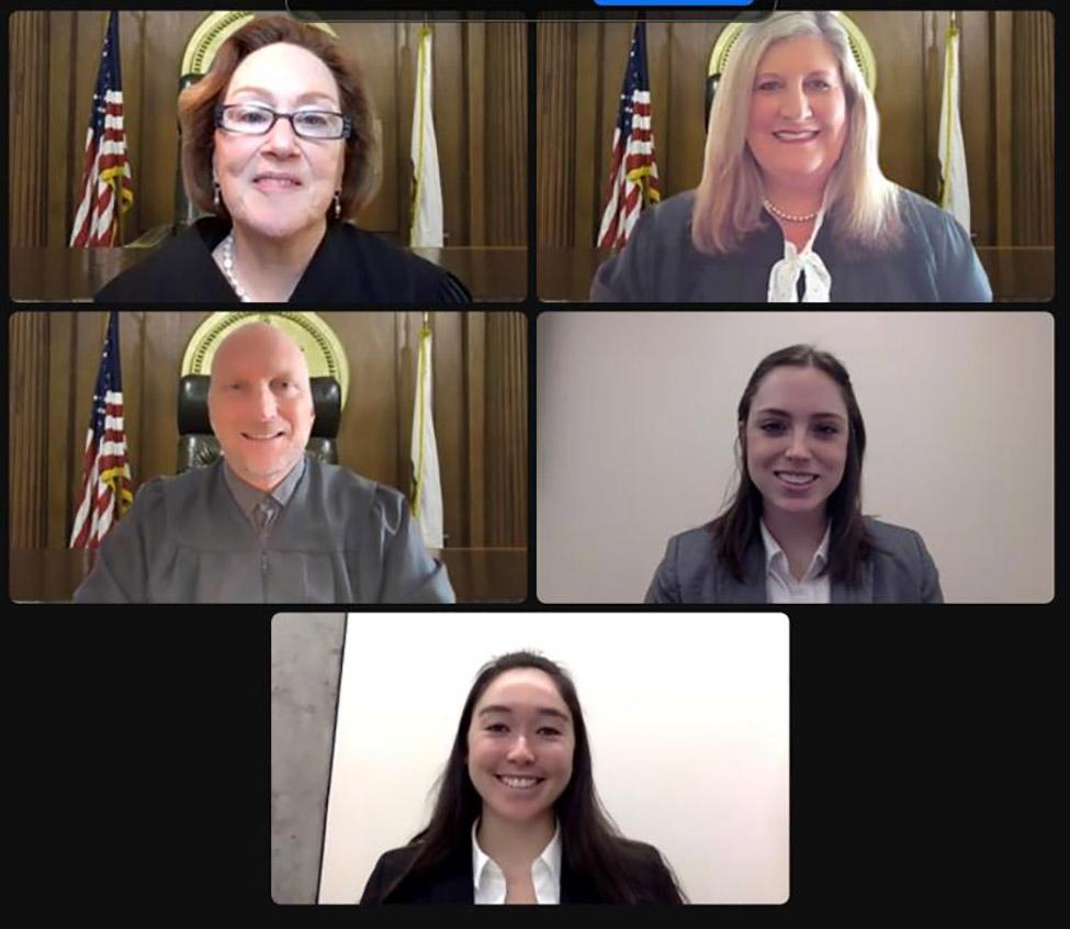 headshots of NELMCC judges and winning team