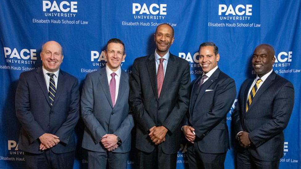 (Left to right) Pace University President Marvin Krislov with Distinguished Service Award recipients Brian S. Hermann and Mayo Bartlett, Haub Impact Award recipient John C. Lettera ’99, and Haub Law Dean Horace E. Anderson Jr.