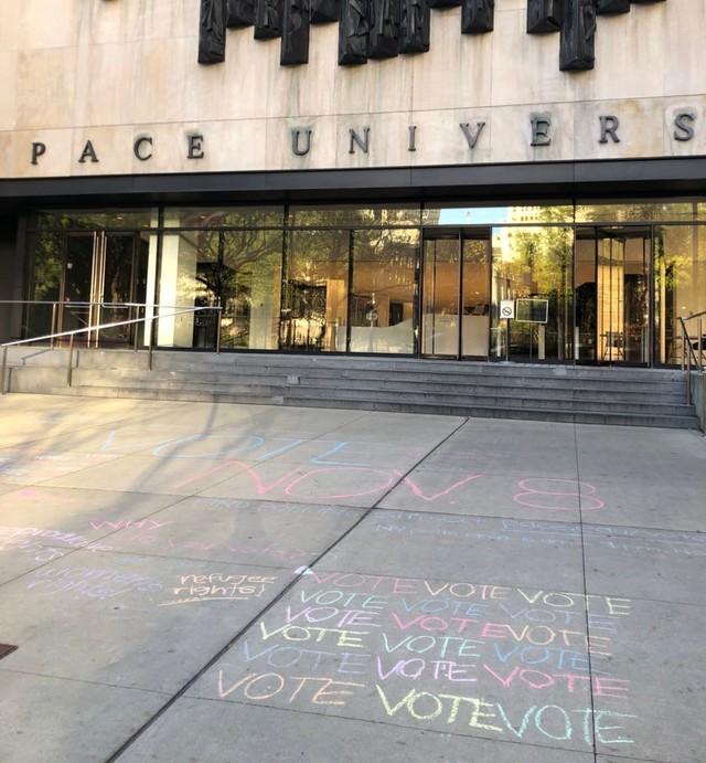 chalk written on the plaza of pace university