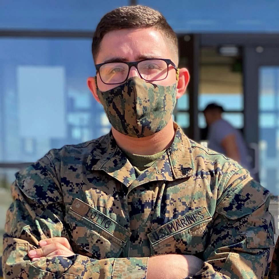 Nicholas Lotto in his military uniform and a camoflauge mask