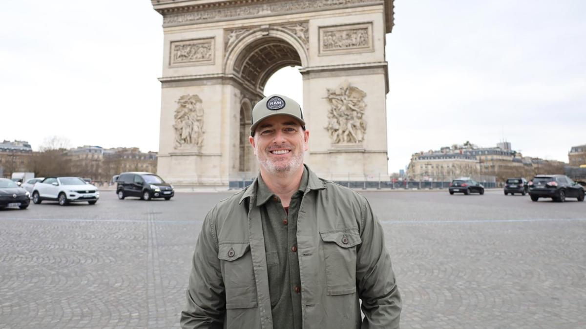 Pace's Jerry McKinstry in front of the Arc de Triomphe in Paris, France