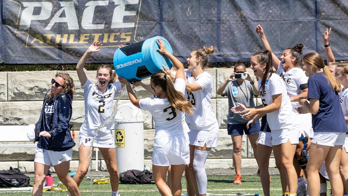 Women's lacrosse team celebrating victory in NCAA tournament