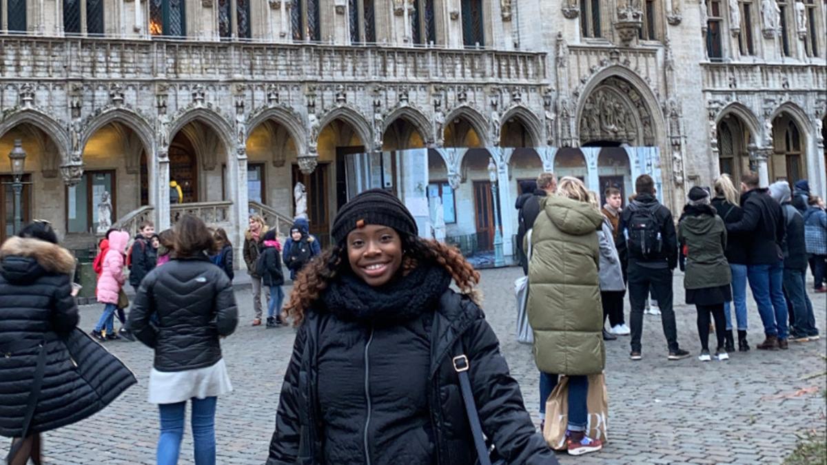 Pace University Lubin student in the Grand Place in Brussels during a 2019 international field study