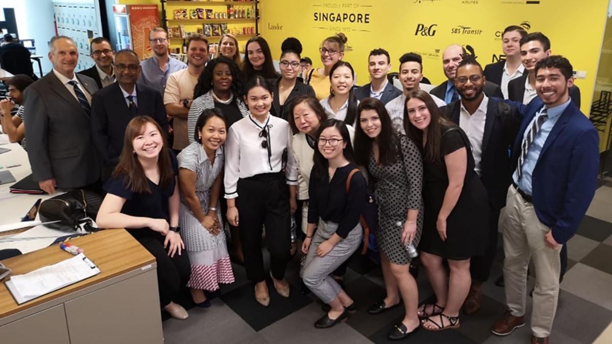 Group of Pace University Lubin students at company office visit during a 2019 field study to Singapore and Malaysia