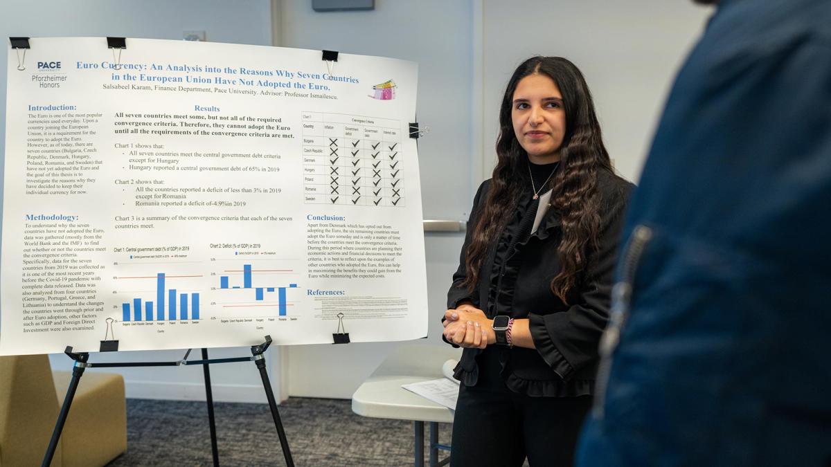 Pace student presenting research at research day