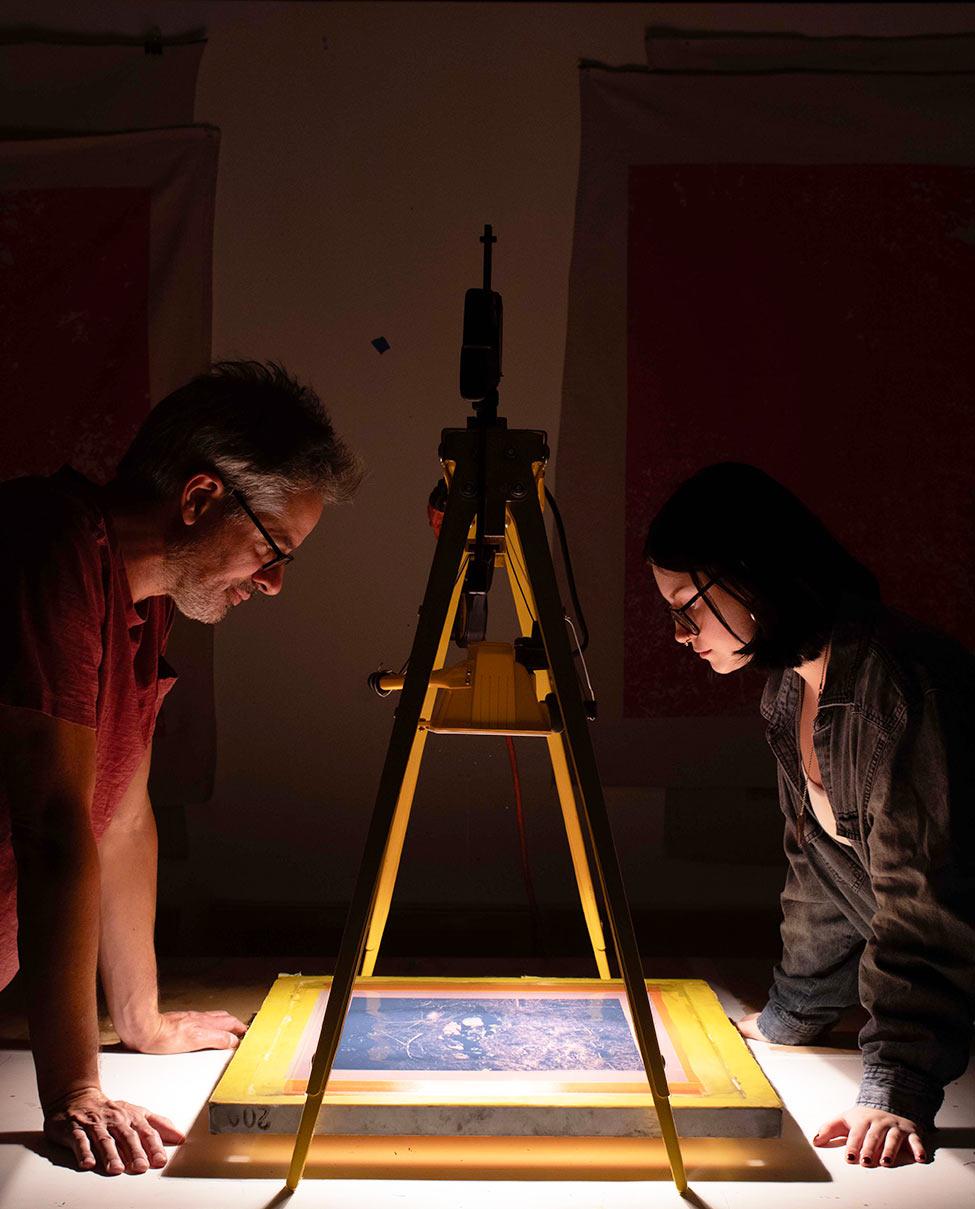 Pace University's Art professor Derek Stroup and Film and Screen Studies student Katie Romanyshyn working together on artwork made possible by the Amelia A. Gould Undergraduate Research Assistantship