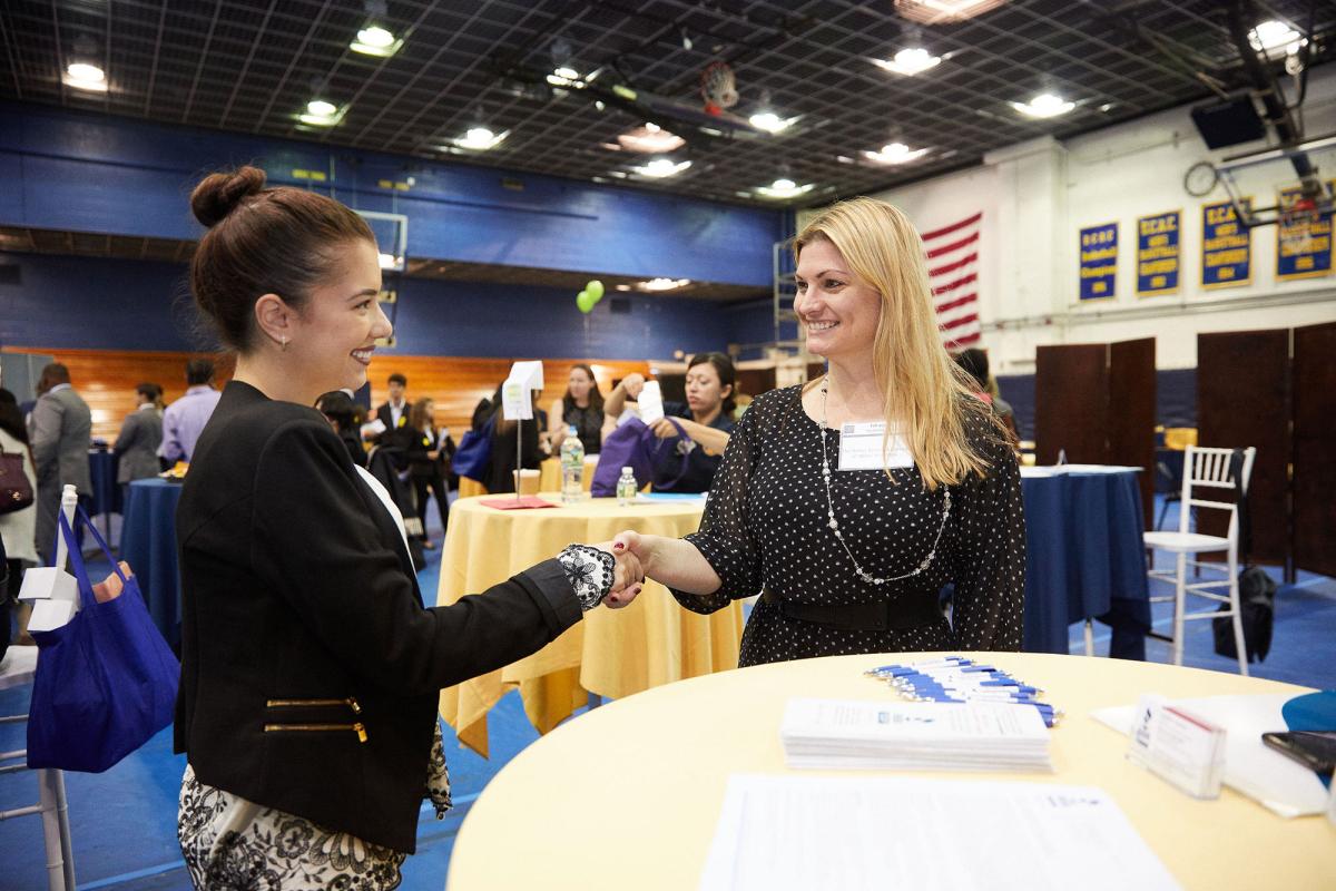 Student interviewing with a potential employer.