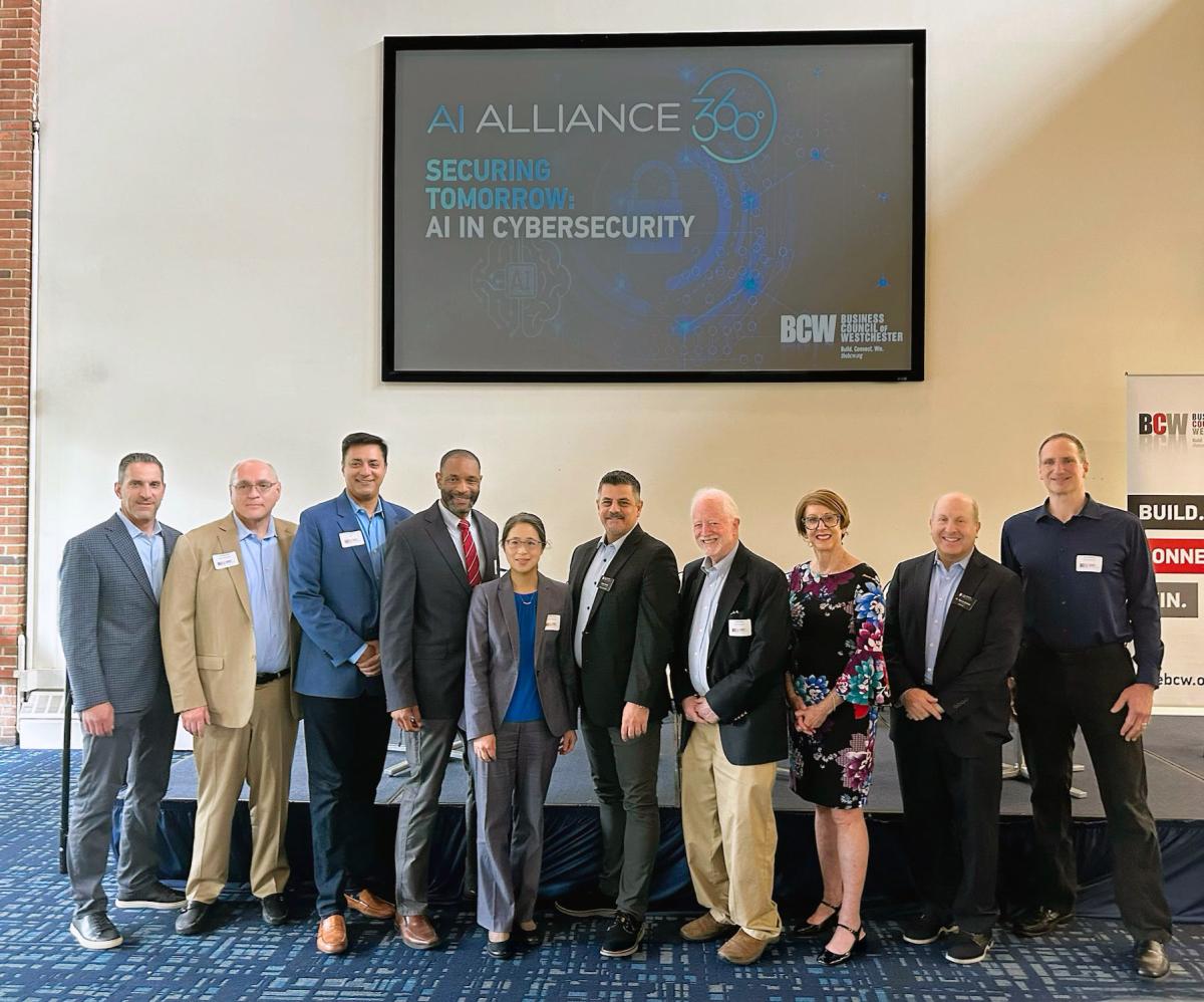 Group photo that includes attendees at the Conference on Artificial Intelligence in Cybersecurity.