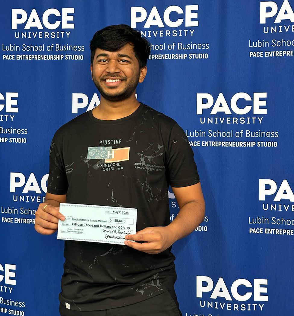Pace University Seidenberg student, Shubham Harishchandra Madhavi posing with his check.