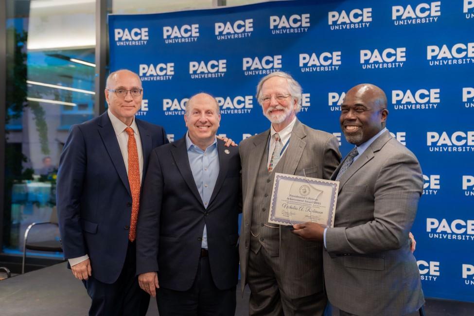 Elisabeth Haub School of Law at Pace University Professor Nicholas A. Robinson posing with Presidential Lifetime Achievement Award