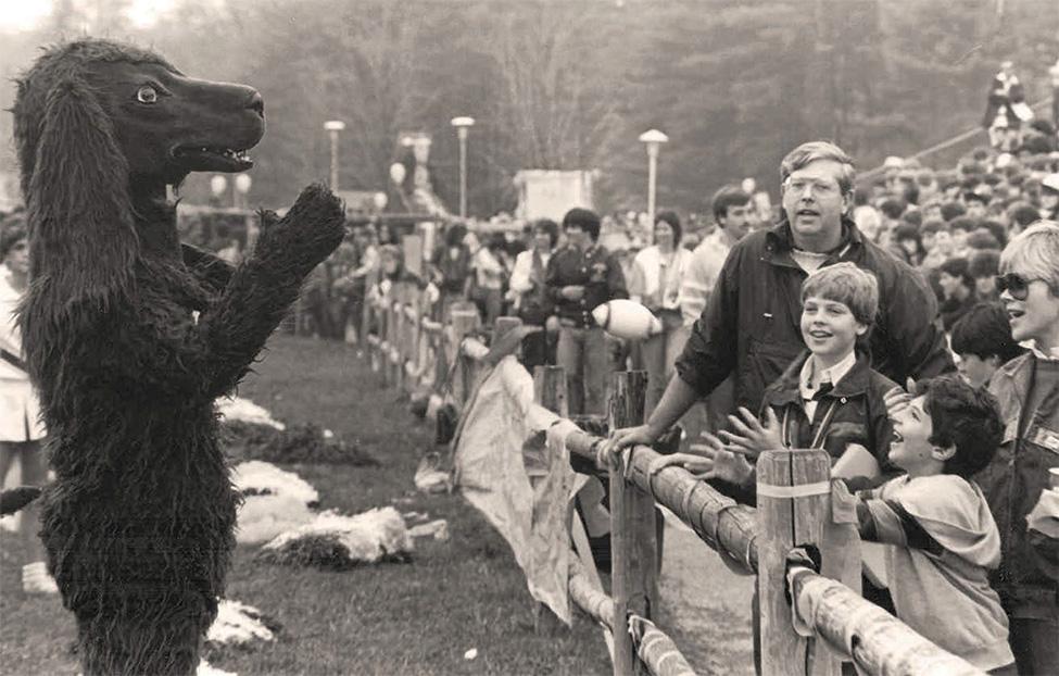 A costumed mascot on the sidelines, probably in the 1980s.
