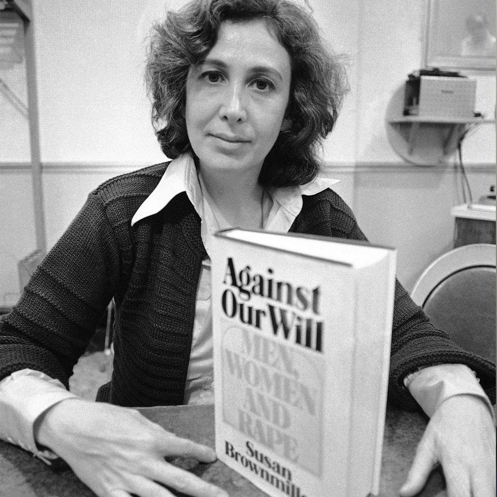 Susan Brownmiller posing with her book Against Our Will.
