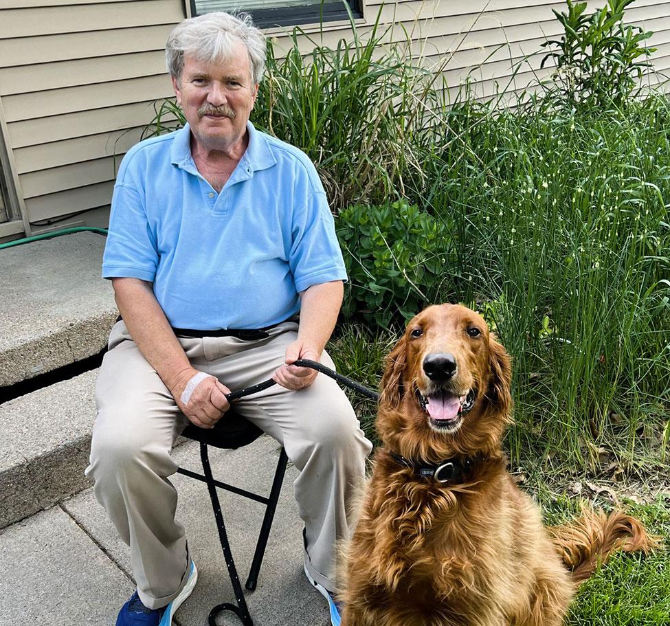 Tom Nipper and Finnegan posing for the camera.