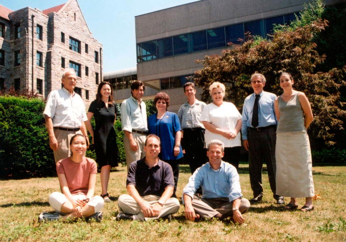 Pace Energy Center faculty and staff in 1980s in front of campus.