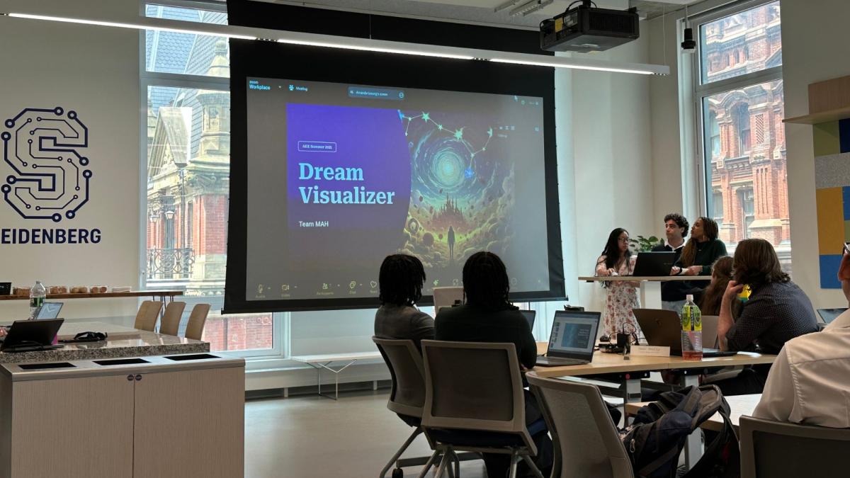 A group of students from the 2025 AI Internship Experience presenting their final project about dream analysis to the rest of the students in the Seidenberg Design Factory space.