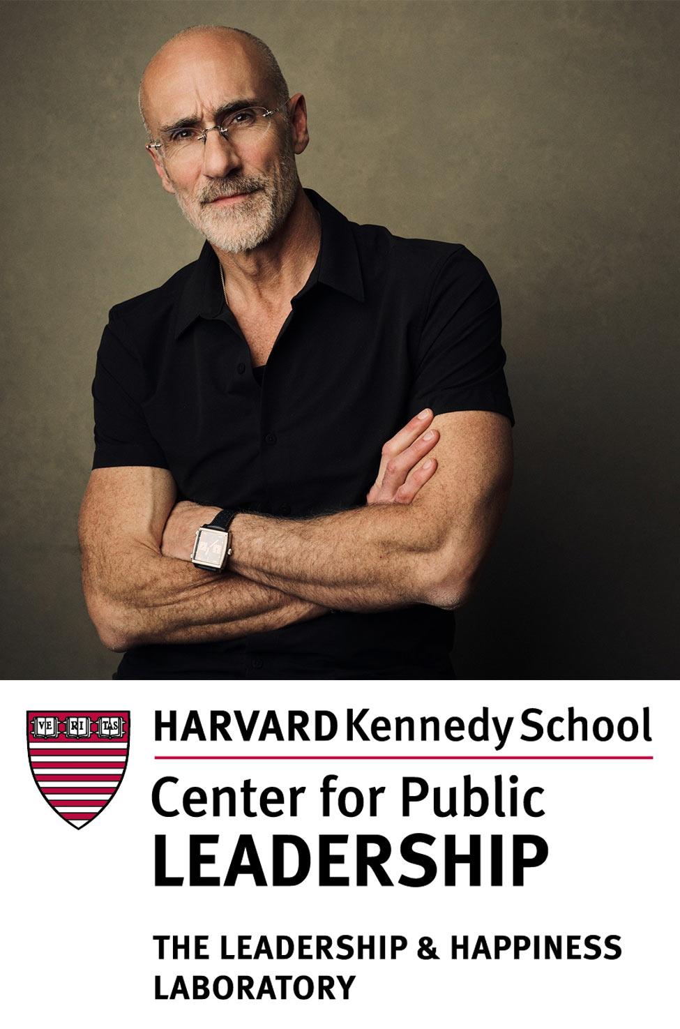 Arthur Brooks above the Harvard Kennedy School Center for Public Leadership logo