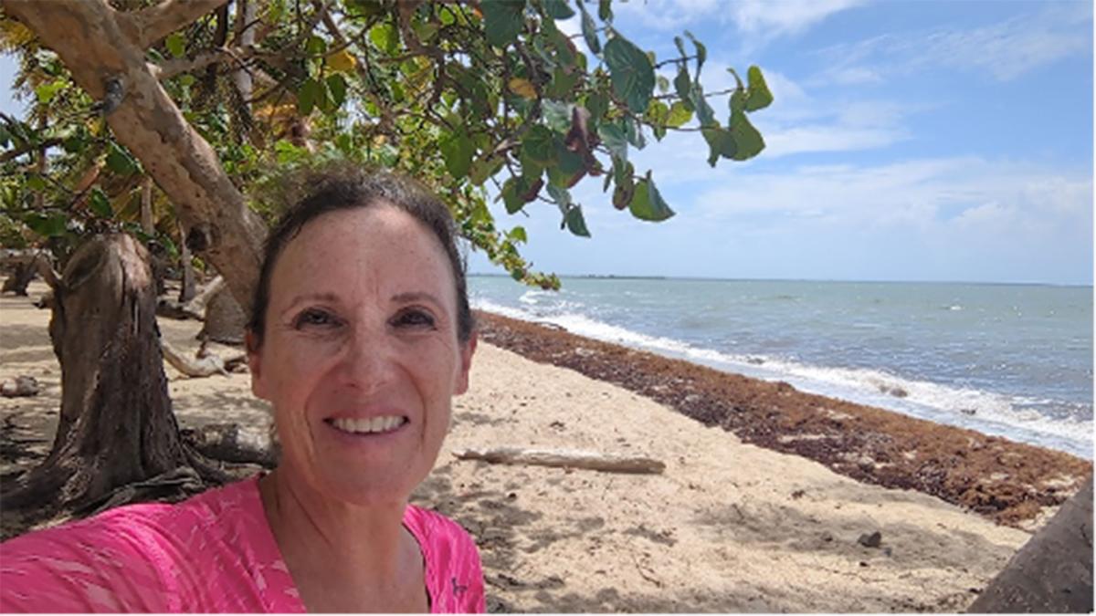 Pace University alum Kim Izzarelli '13 working as a Peace Corps Youth Development volunteer in Belize. 