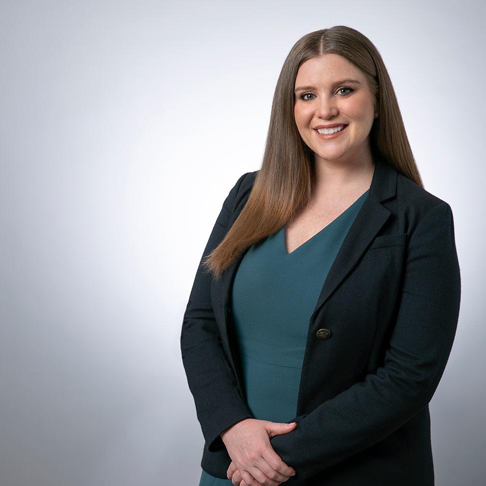 Morgan Stanley executive director Kaitlin Elliott in front of a grey background 