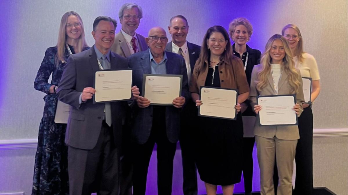 Elisabeth Haub School of Law at Pace University Adjunct Professor Gleason Alvarez pictured amongst colleagues at the CPR Awards holiding certificates