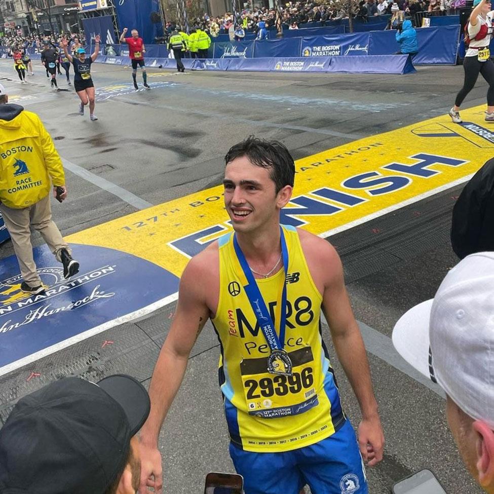 Pace University Lubin School alumnus Henry Richard ’25 running the Boston marathon.