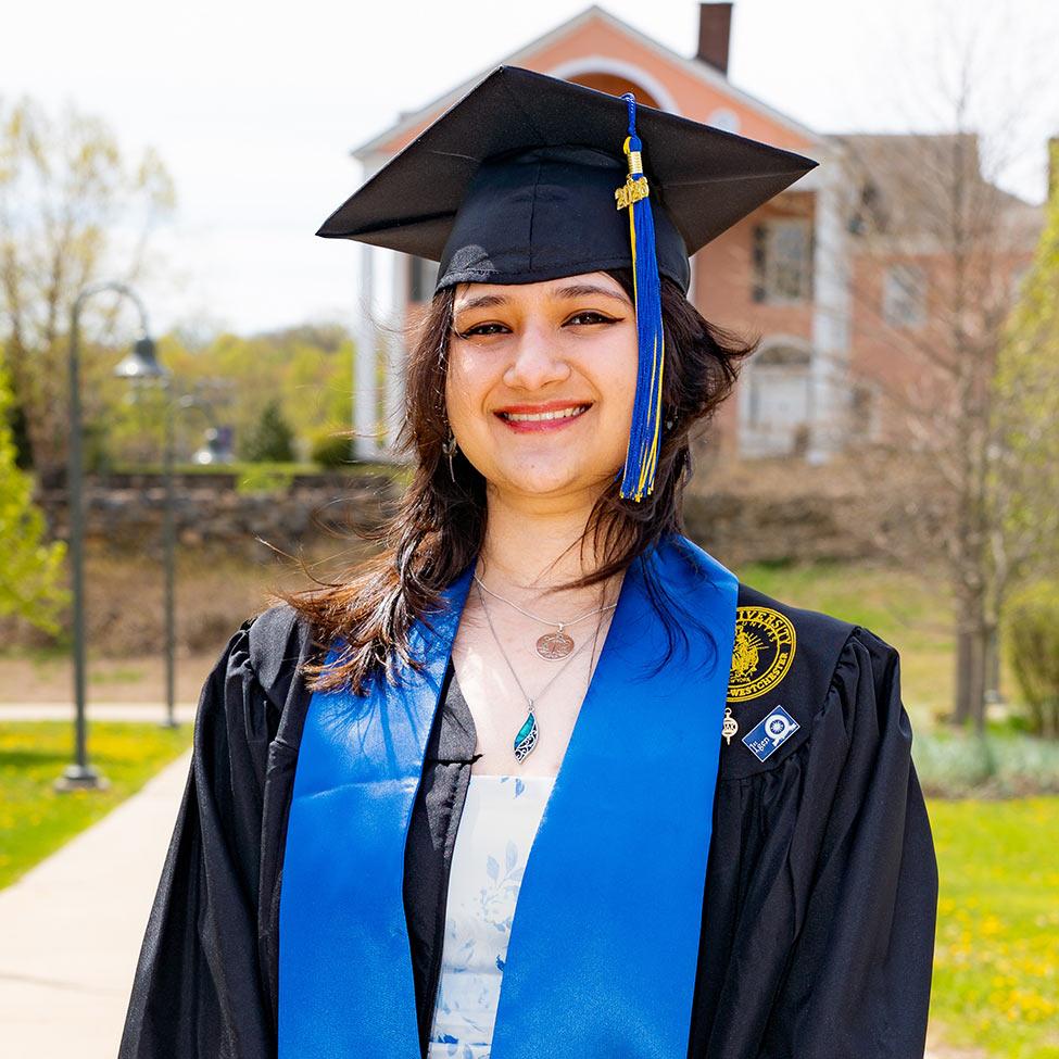 Pace University student Alisha Bhandari in her graduation regalia