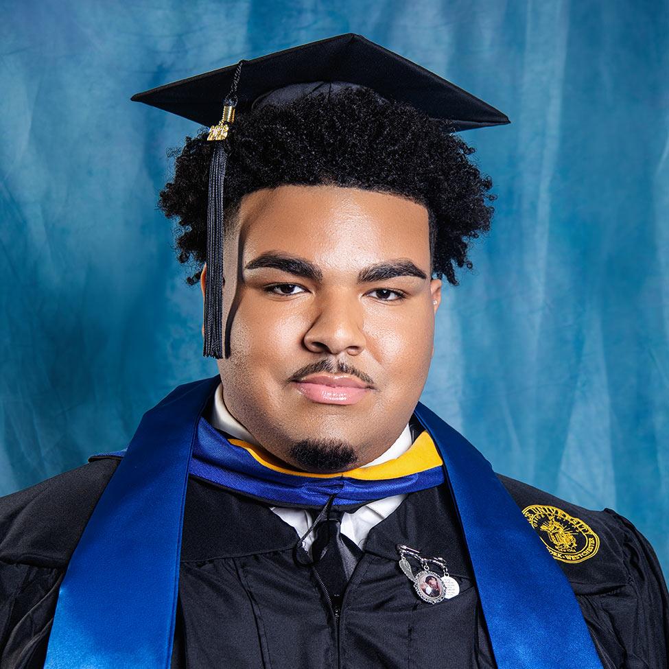 Pace University student Nicholas Diaz in his graduation regalia