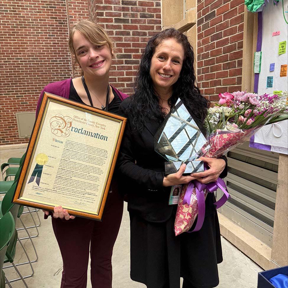 Pace University Professor of Criminal Justice and Security Kimberly Collica-Cox, PhD, with student Alicia Bennett holding awards