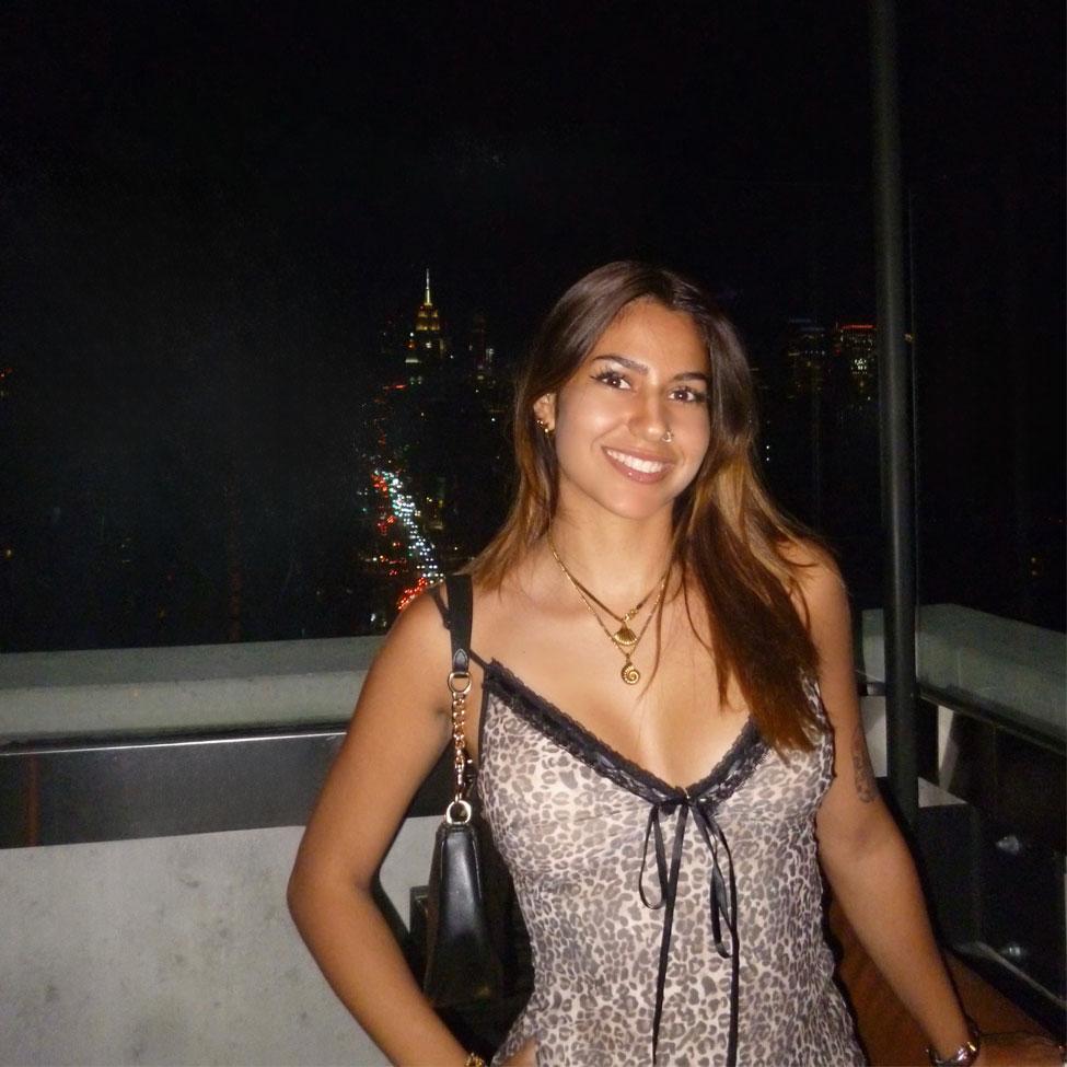 Camila Valenzuela Gonzalez posing for the camera on an NYC rooftop.