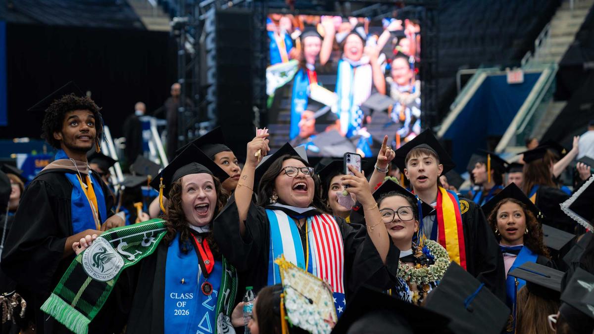 Pace University grads celebrating at the 2026 commencement ceremony