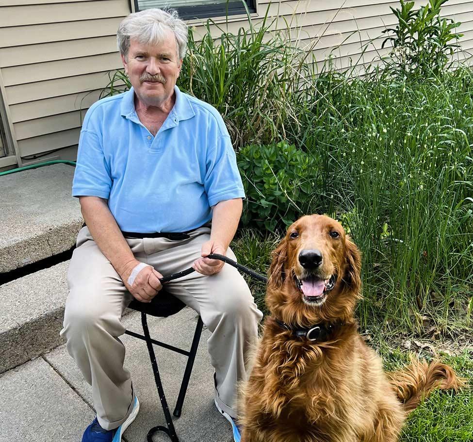 Tom Nipper and Finnegan posing for the camera.