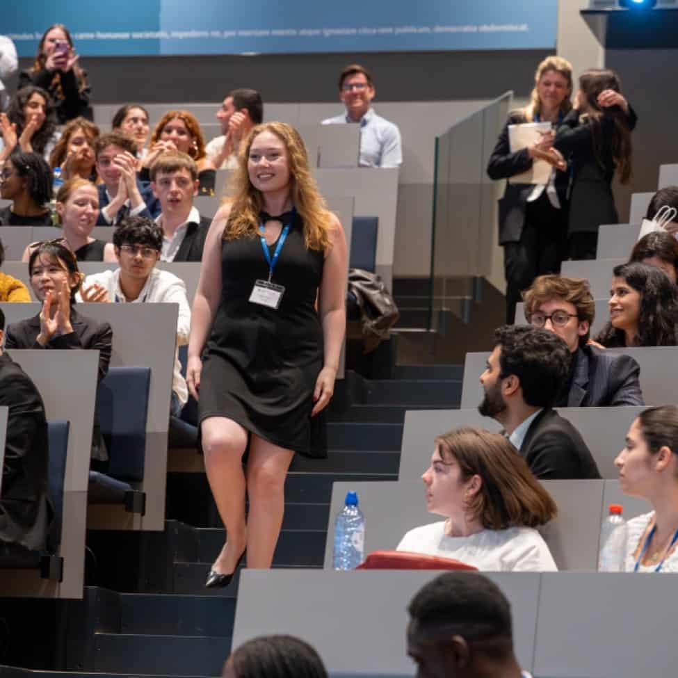 Elisabeth Haub School of Law at Pace University student Sophie Bacas walking down stairs
