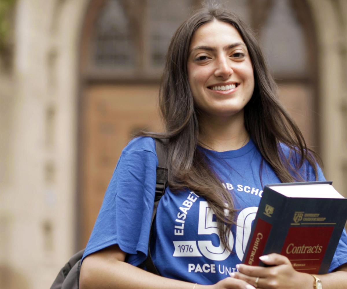 Law student wearing 50th anniversary t-shirt