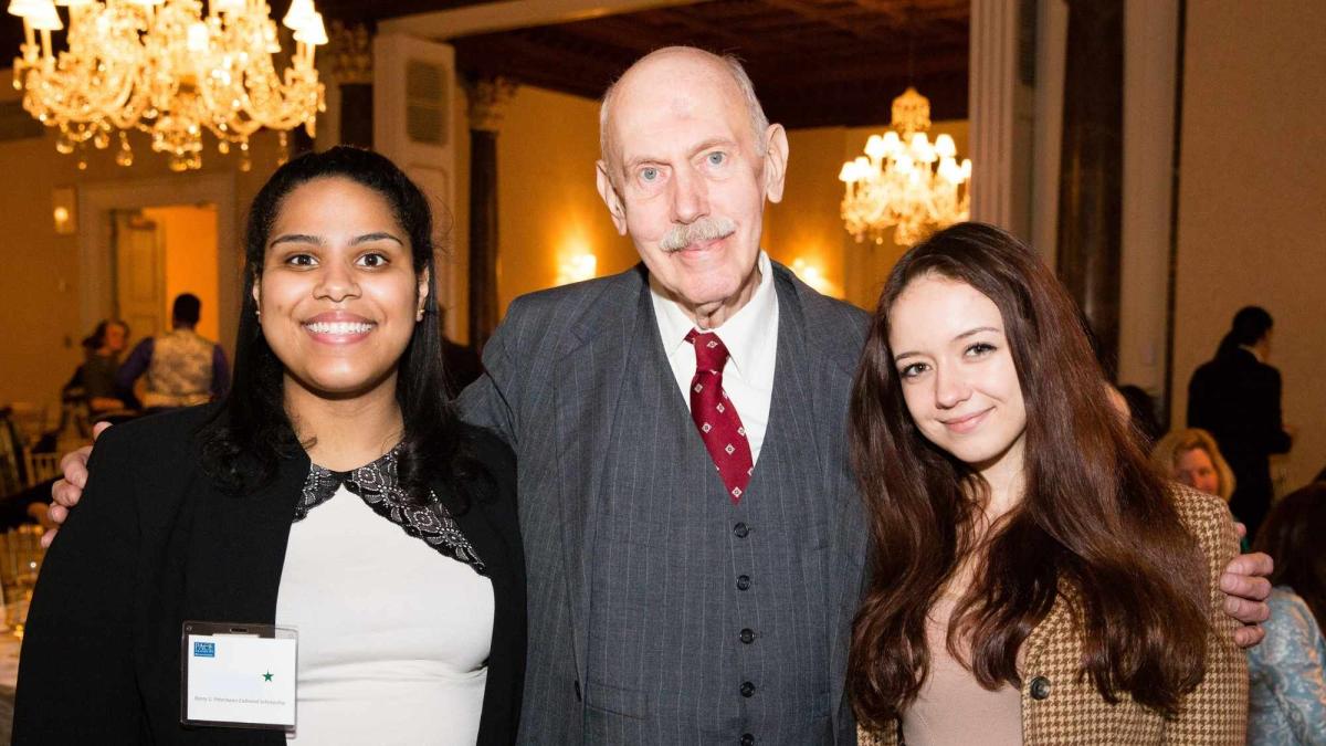 Henry Petermann posing with his scholarship recipients