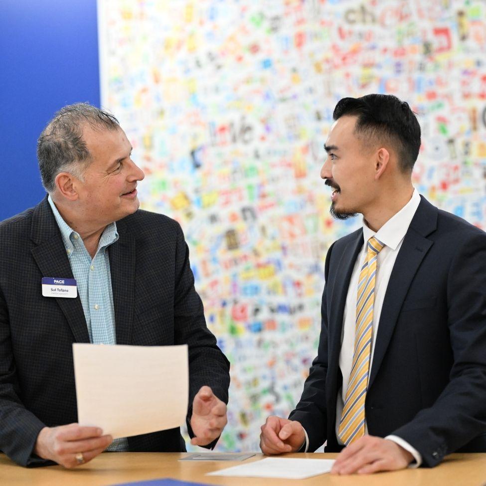 Student receiving advice from a mentor