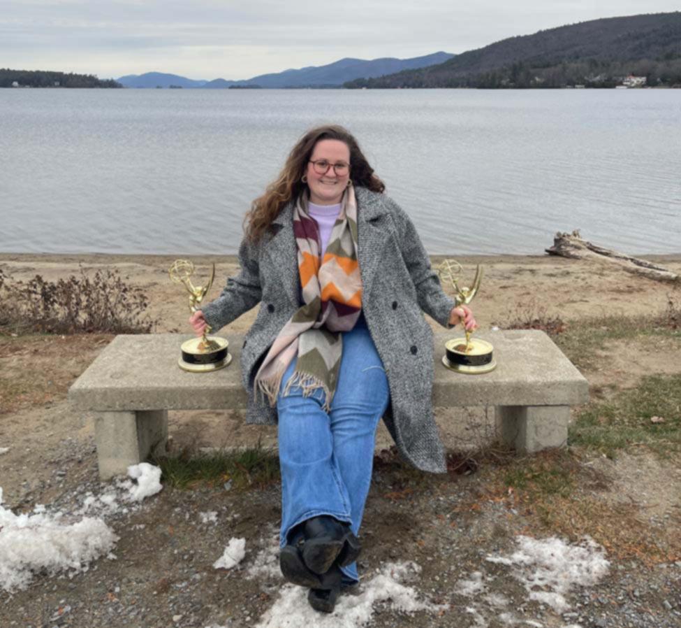Jessika Pietryka posing with her two Emmy awards.
