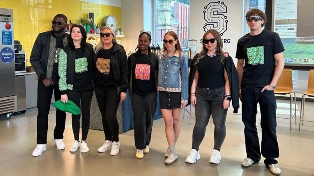Sarah Lin and Dr. Scharff with fellow participants at the event's fashion show