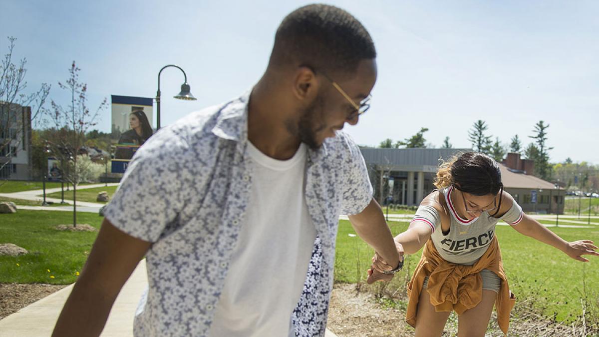 Students enjoying a sunny day on the Westchester campus.